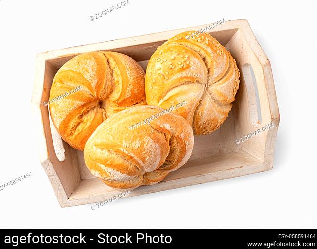 Tasty fresh buns with sesame seeds, isolated on white background