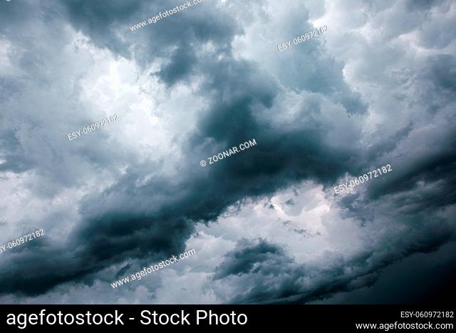 Big storm clouds background view from ground surface