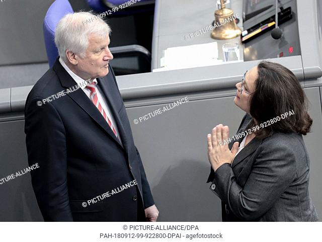 12 September 2018, Berlin: Horst Seehofer (CSU), Federal Minister of the Interior, for Building and Home Affairs, and Andrea Nahles (r)