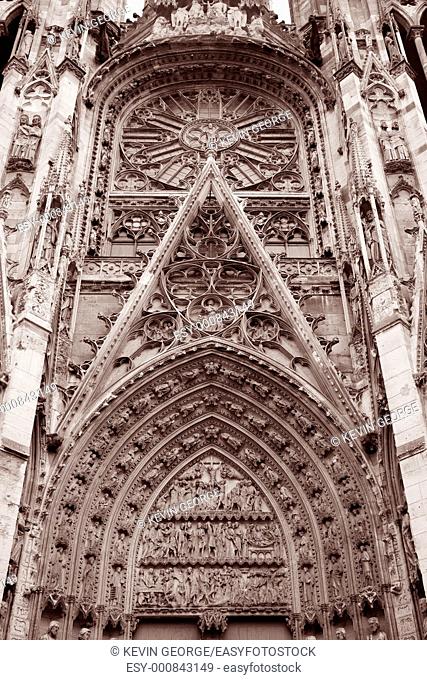 Detail on on one Entrance to Rouen Cathedral in Black and White Sepia Tone, Normandy, France
