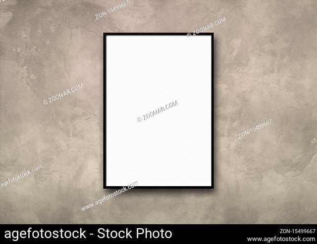 Black picture frame hanging on a light concrete wall. Blank mockup template