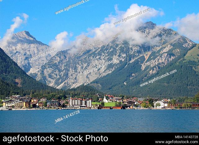 pertisau am achensee, tyrol, austria, europe, karwendel mountains in the background, wisps of fog, little clouds in the sky