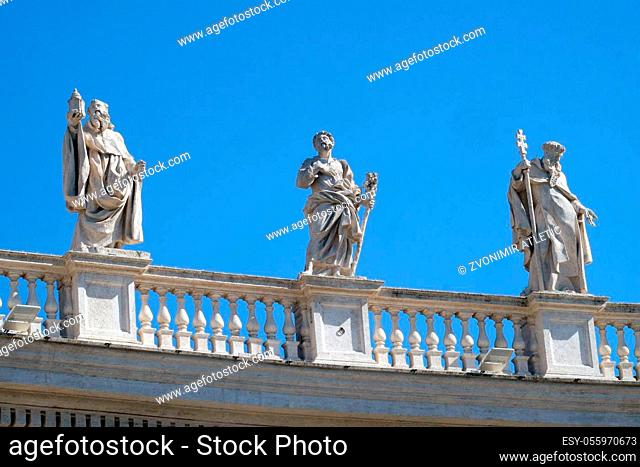 St. Romuald, Joseph and Peter Nolasco, fragment of colonnade of St. Peters Basilica. Papal Basilica of St. Peter in Vatican, Rome, Italy