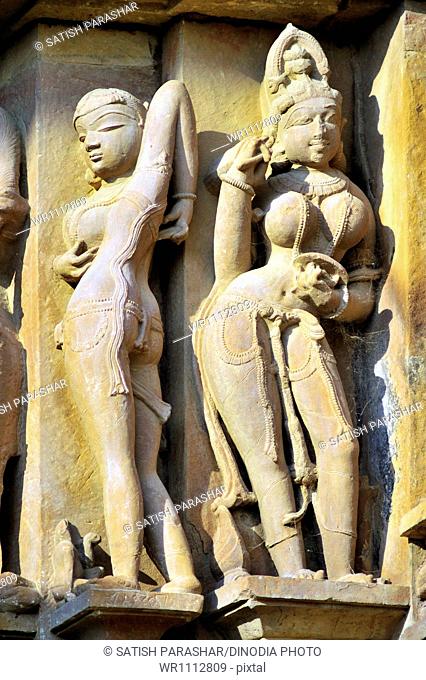 Apsara and nayika scratching back vishvanath temple Khajuraho madhya pradesh india