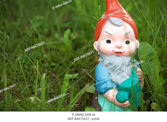 A garden gnome in the grass Switzerland
