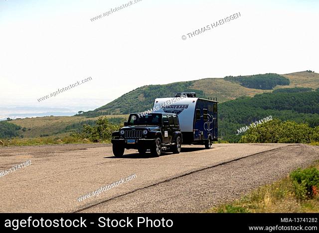 Parking Jeep and Caravan at a Vista Point near Boulder, Utah, USA. Parking Jeep and Caravan at The Hogback - a Vista Point near Boulder, Utah, USA
