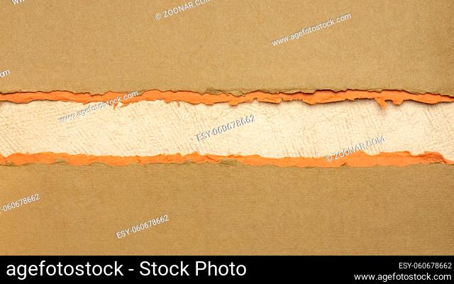 paper abstract in brown, orange and beige with a copy space - sheets of handmade paper, diagonal blank web banner