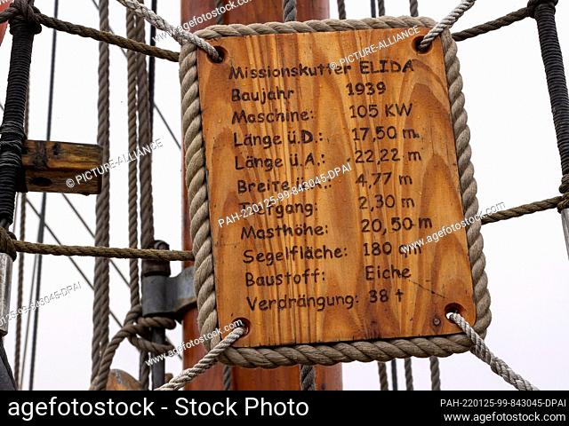 25 January 2022, Mecklenburg-Western Pomerania, Greifswald: A wooden board with technical specifications hangs on the missionary cutter ""Elida"", built in 1939