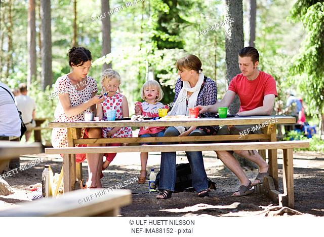 Family having picnic at zoo