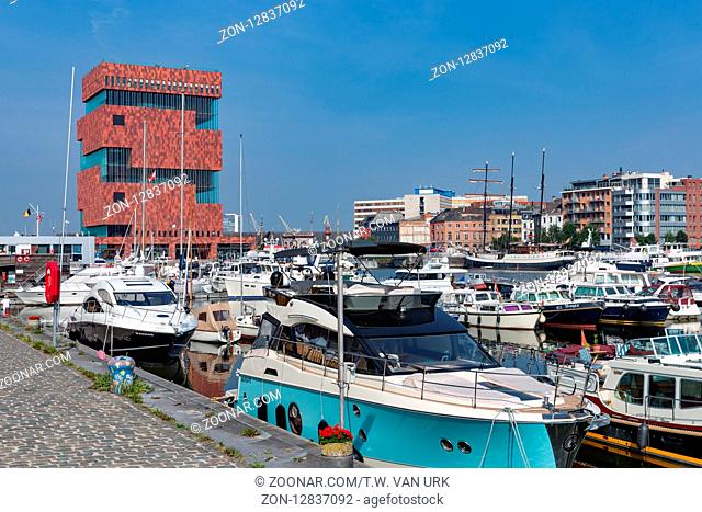 ANTWERP, BELGIUM - AUG 13: Marina harbor with yachts and sail boats near museum MAS on August 13, 2015 in the harbor of Antwerp, Belgium