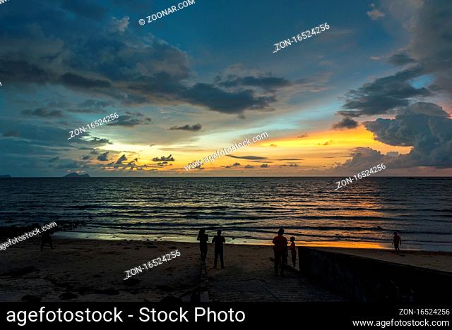 View to the South China Sea at sundown on the Damai beach in the Santubong national park in the north of the city Kuching on Borneo