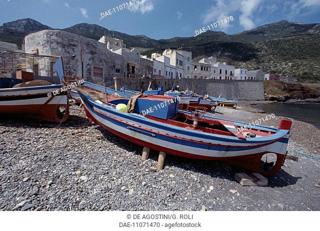 Small fishing boats docked on dry land, Marettimo Island, Aegadian Islands, Sicily, Italy