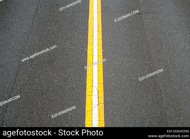 white line on asphalt road - two lane street