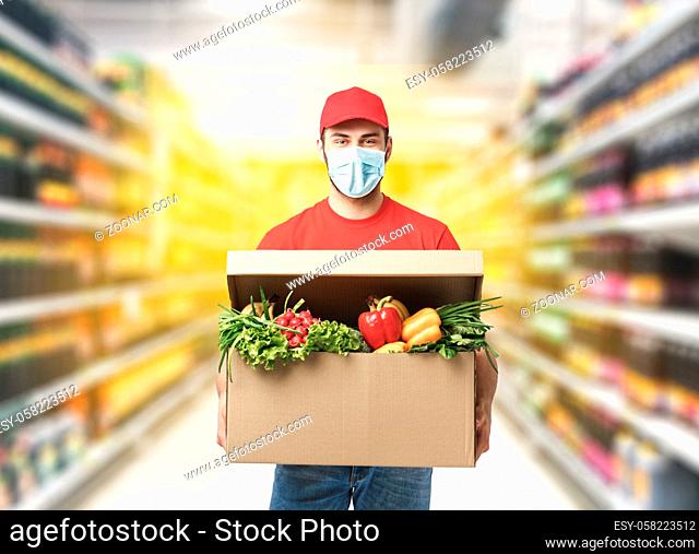 Delivery company worker holding grocery box, food order, supermarket service