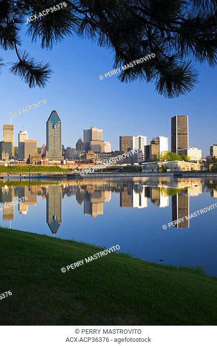 Montreal Skyline reflected in the Lachine Canal at Sunrise, Quebec, Canada