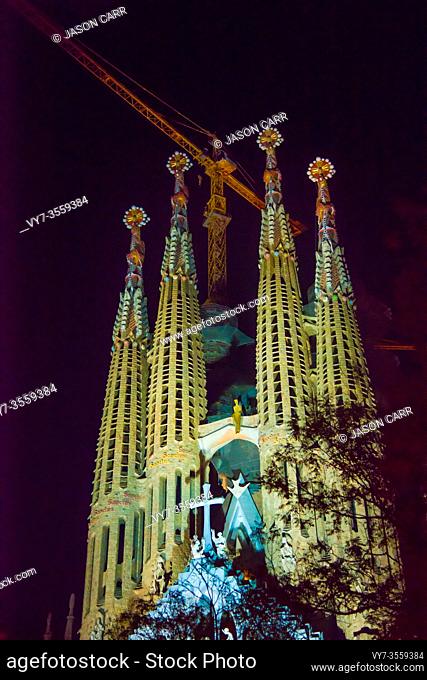 BARCELONA, SPAIN - December 24, 2018: La Sagrada Familia's construction in progress during the Christmas season. It is on the part of UNESCO World Heritage site...