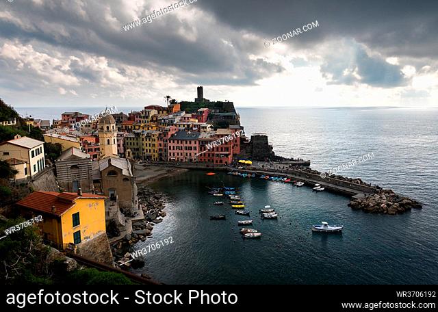 Picturesque and romantic village of Vernazza with colourful houses and small beautiful port at CinqueTerre, Liguria, Italy