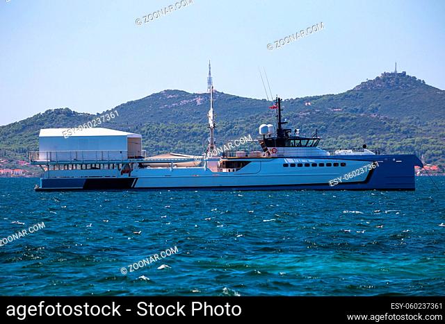 Zadar, Croatia, August 15 2019: Power Play scientific boat in Zadar channel view. Unique superyacht support vessel can ofetn be seen in Adriatic archipelago