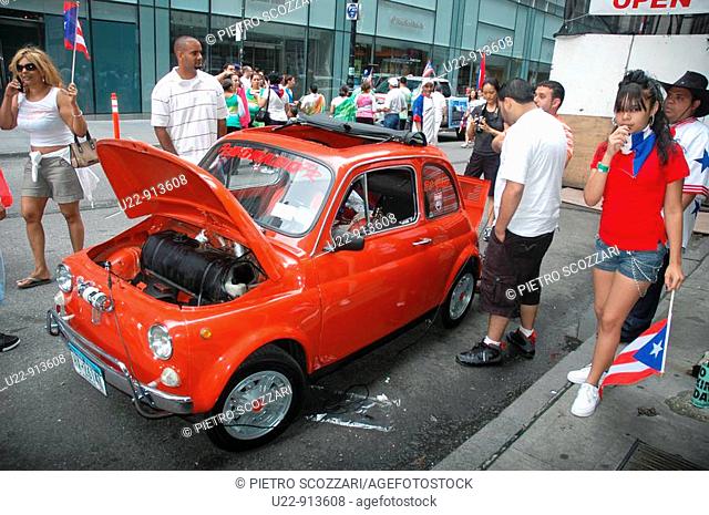 New York City (USA): an Italian car FIAT Cinquecento at the Puerto Rican parade