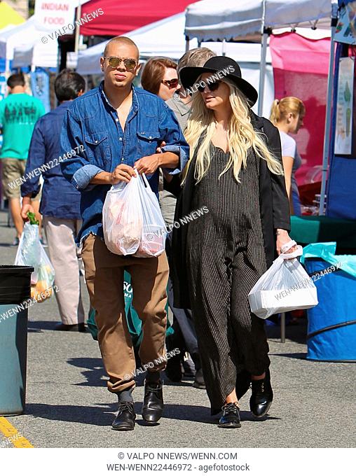 Heavily pregnant Ashlee Simpson buys fresh salsa, strawberries and a jumbo sausage sandwich together with a watermelon drink at the Studio City Farmers Market...