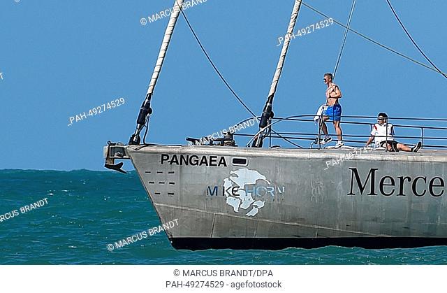 German national soccer player Bastian Schweinsteiger (L) is seen on the boat ""Pangaea"" of adventurer Mike Horn in Santo Andre, Brazil, 10 June 2014