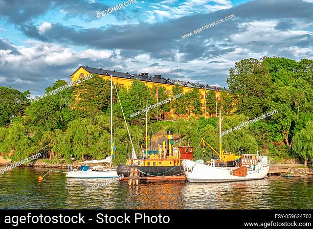 STOCKHOLM/SWEDEN - AUGUST 2, 2019: View on coastline of Skeppsholmen island with boats and ships