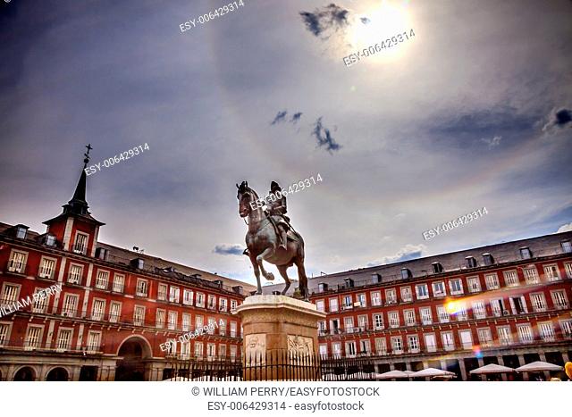 Plaza Mayor Built in the 1617 Famous Square Cityscape Madrid Spain. King Philip III Equestrian Statue, created in 1616 by Sculptors Gambologna and Pietro Tacca