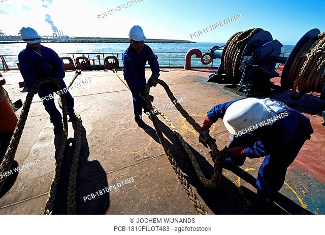 Crew of bulk carrier preparing for arrival in the Port of Rotterdam