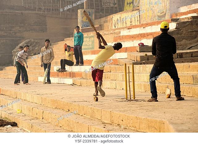 Boys playing cricket at the ghats of Varanasi