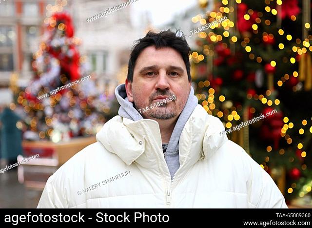 RUSSIA, MOSCOW - DECEMBER 19, 2023: The project's curator, fashion designer Artyom Krivda attends the opening of an exhibition of designer Christmas trees in...