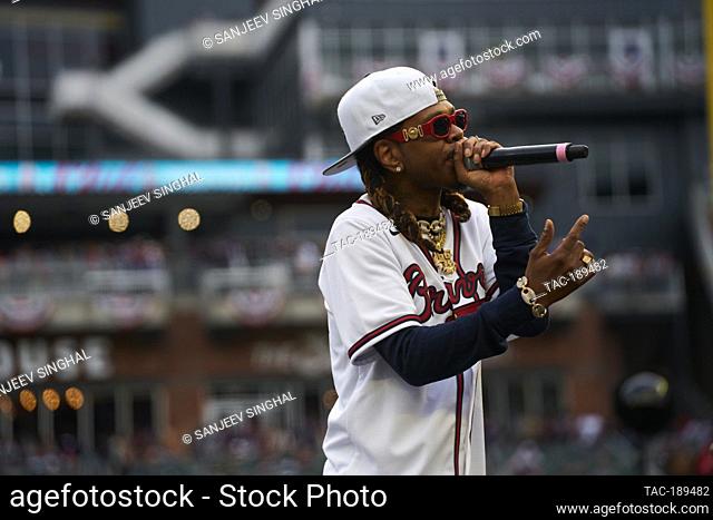 Atlanta native Ludacris performs at a ceremony after a parade to celebrate the World Series Championship for the Atlanta Braves at Truist Park in Atlanta