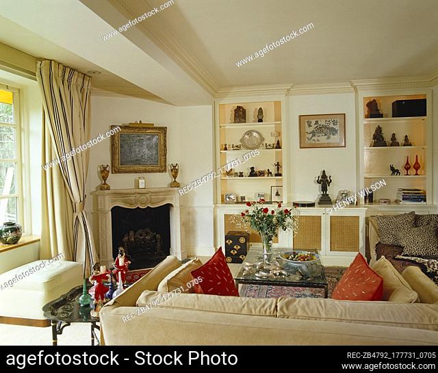 Upholstered sofa facing corner fireplace
