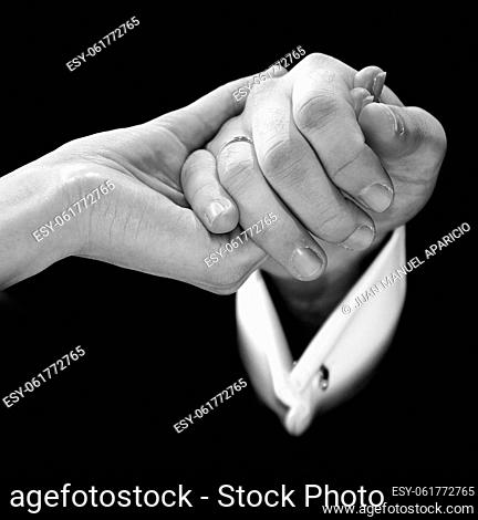 Young couple holding hands