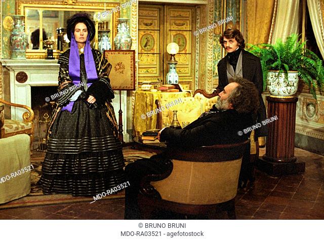 Italian actor Fabrizio Bentivoglio and French actress Clio Goldsmith acting in a living room in The Lady of the Camellias. Italy, 1981