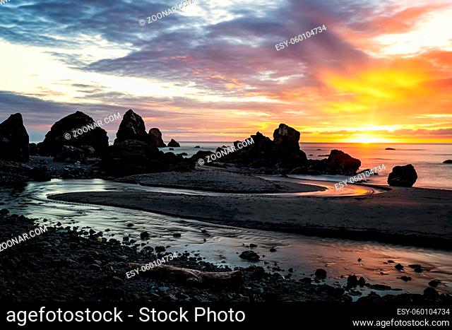 A dramatic sunset seascape at a northern California beach. USA