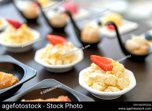 Collection of delicious assorted mini dessert. Wedding catering