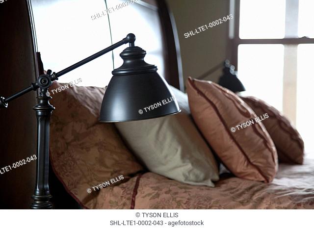 Reading lamp beside bed