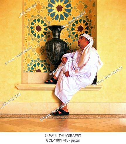 Pensive Arab man