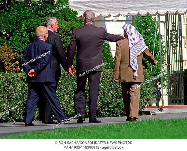 From left to right: King Hussein of the Hashemite Kingdom of Jordan, Prime Minister Benyamin Netanyahu of Israel, United States President Bill Clinton
