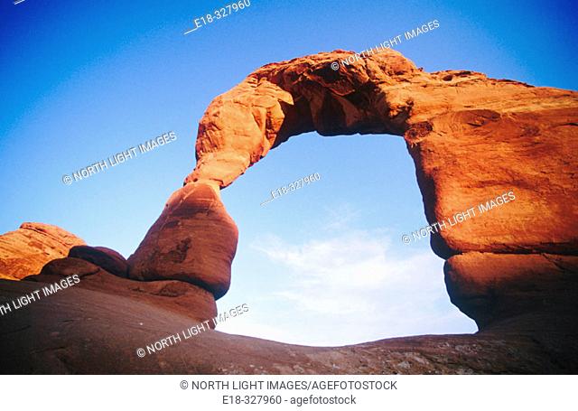 USA, Utah, Moab. The Delicate Arch at sunset, most famous of the Arches National Park features