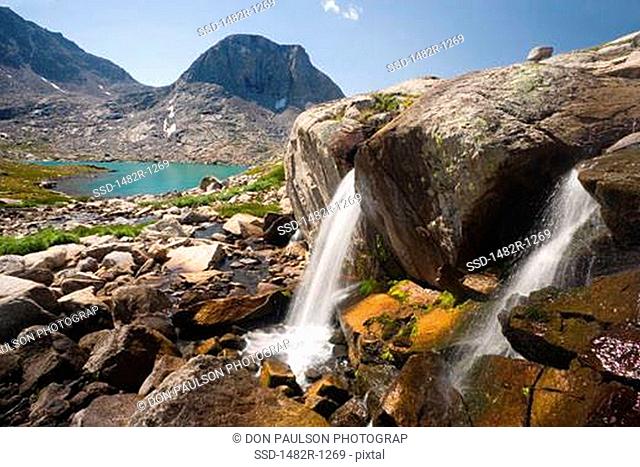 Waterfalls with a lake in the background, near Indian Basin, Bridger-Teton National Forest, Wind River Range, Wyoming, USA