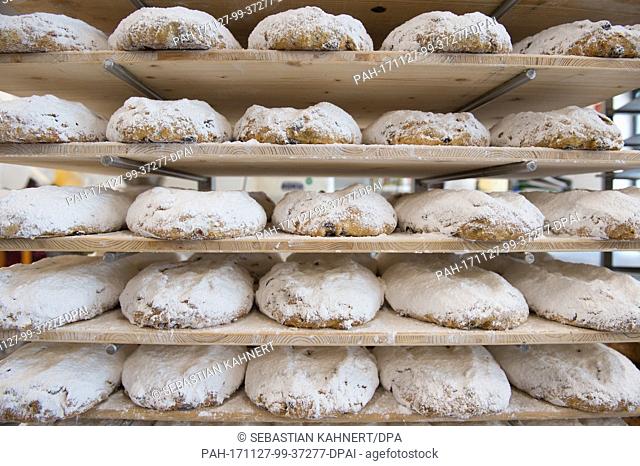 Several stollen lie on a tray in the bakery Wippler inÂ Dresden, Germany, 27 November 2017. Stollen is a traditional German bread usually eaten during Christmas...