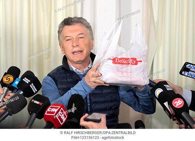 Mauricio Macri, President of Argentina, gives a press statement at the polls in a polling station in Buenos Aires following his vote in the primaries for the...