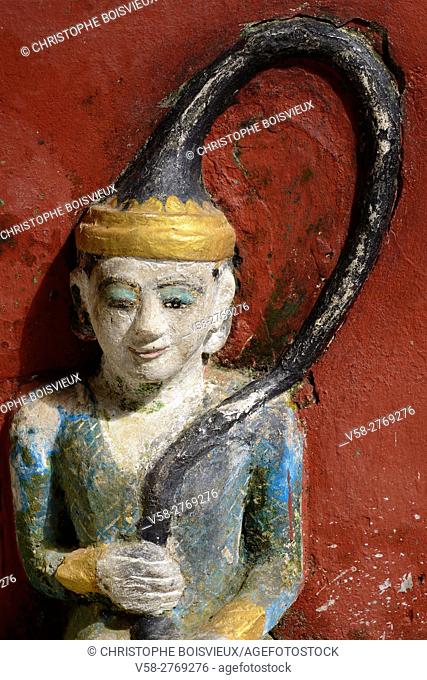 Myanmar, Kayin (Karen) State, Hpa-An surroundings, Kawgun cave, Earth goddess Vasundhara. . The mother earth is personified here as a young woman wringing the...