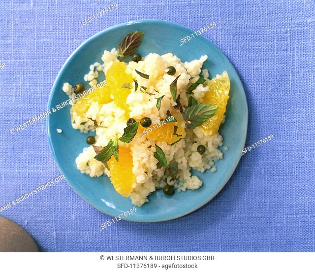 Couscous with pineapple sage, oranges and green pepper
