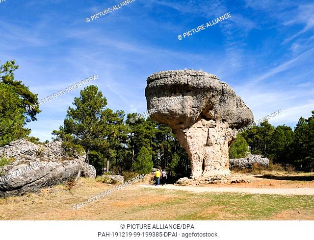 03 October 2019, Spain, Cuenca: Rock formations in the Ciudad Encantada (""enchanted city""), a limestone landscape in a large pine forest in the highlands near...