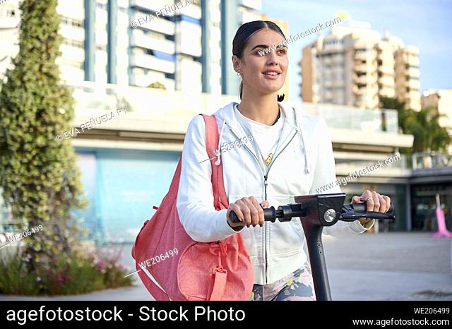Young woman doing sport outdoors in the city.