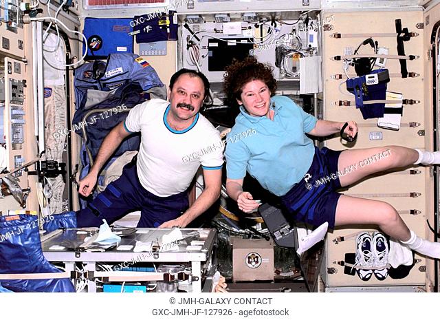 Cosmonaut Yury V. Usachev (left), Expedition Two mission commander, and astronaut Susan J. Helms, Expedition Two flight engineer