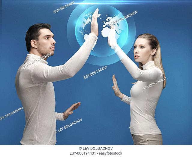 future, technology, business, education and people concept - man and woman working with globe hologram