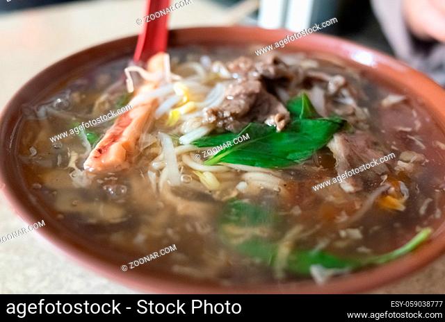 Taiwanese thickened soup noodle with lamb and squid potage